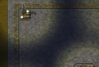 Canto de um bloco à noite, com as lâmpadas acesas, capturado no jogo